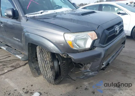 2015 Toyota Tacoma Base V6 z USA, uszkodzony, nr VIN 5TFLU4EN6FX119944